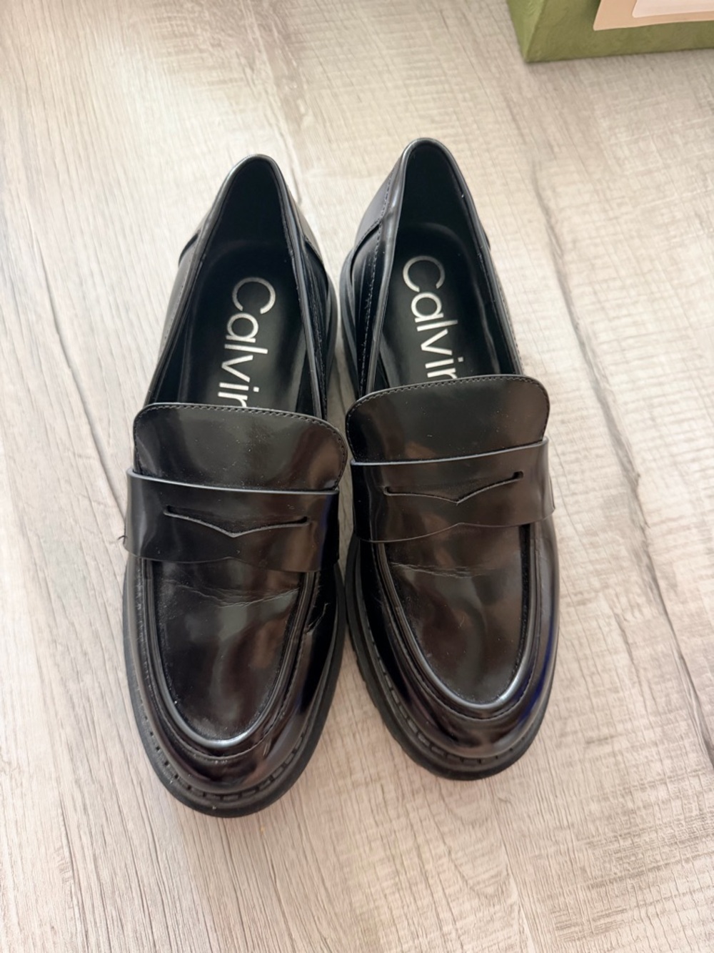Calvin Klein Shiny Black Leather Slip-On Penny Loafers